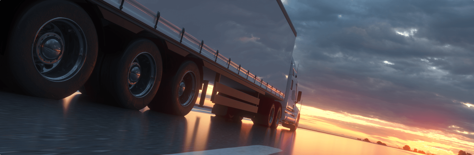 A truck riding in a rising sun